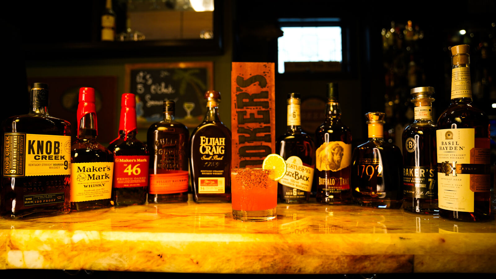 The bourbon lineup on the bar at Prime 225