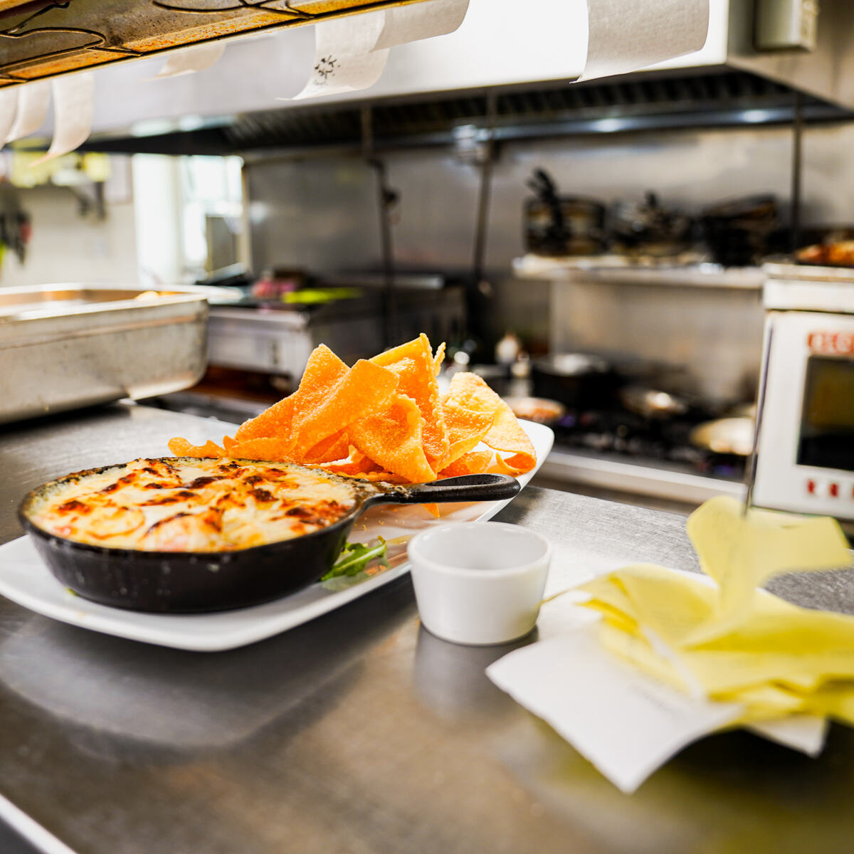 A dish at the kitchen pass
